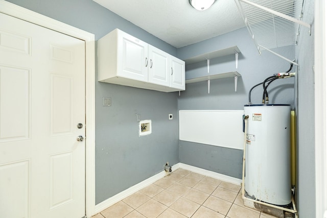 laundry room featuring water heater, hookup for a washing machine, cabinet space, and hookup for an electric dryer
