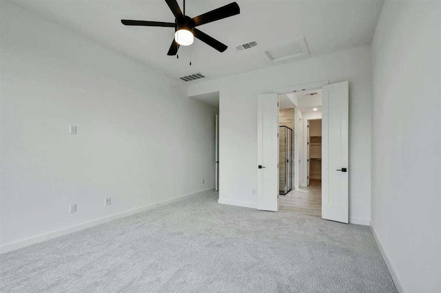 5818 Reef Ridge Dr, Manvel, TX 77578 - unfurnished bedroom with attic access, light carpet, baseboards, and a ceiling fan