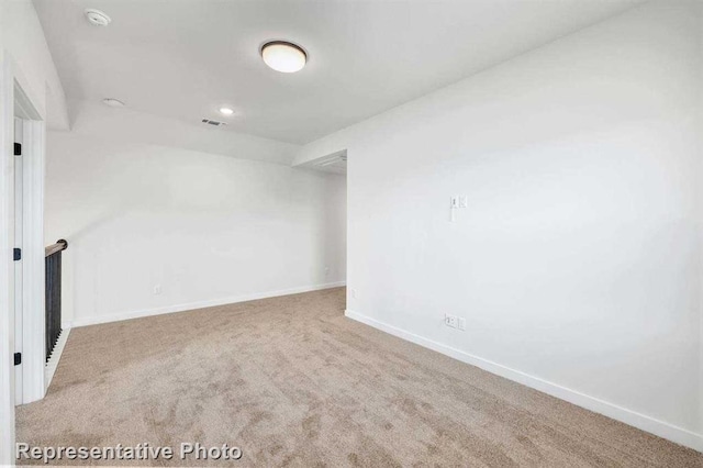 5818 Reef Ridge Dr, Manvel, TX 77578 - unfurnished room with carpet floors, baseboards, a smoke detector, and recessed lighting