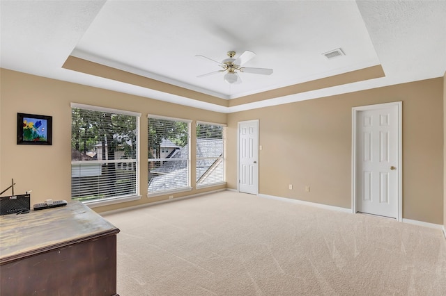 5810 Redwood River Dr, Kingwood, TX 77345 - unfurnished office featuring a raised ceiling, ceiling fan, carpet floors, and baseboards
