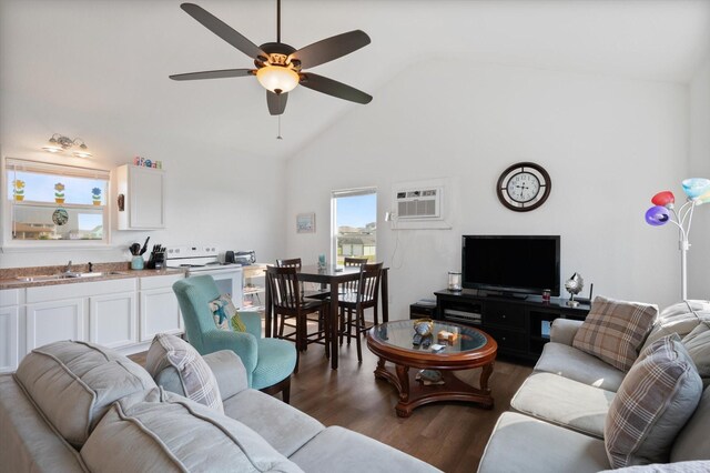 living area with a ceiling fan, a wall mounted AC, dark wood-style flooring, and high vaulted ceiling