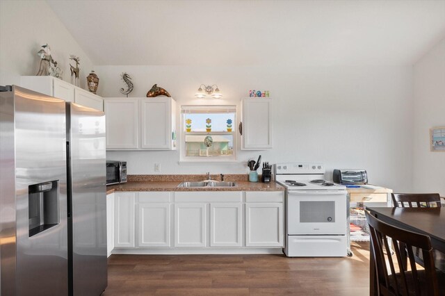 kitchen featuring stainless steel fridge with ice dispenser, white range with electric cooktop, a sink, white cabinets, and dark wood-type flooring
