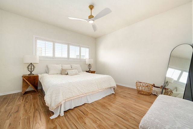 2100 Huldy St Unit 4, Houston, TX 77019 - bedroom featuring multiple windows, baseboards, and wood finished floors