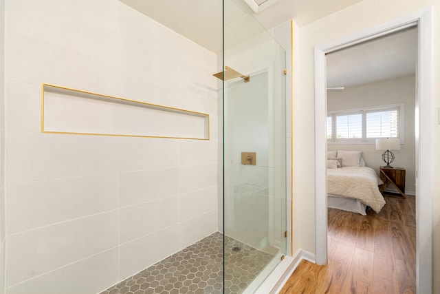 2100 Huldy St Unit 4, Houston, TX 77019 - bathroom featuring walk in shower, wood finished floors, ensuite bath, and baseboards