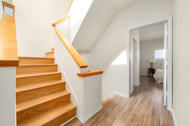 2100 Huldy St Unit 4, Houston, TX 77019 - staircase with wood finished floors and baseboards