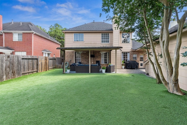 2112 Shadow Bay Cir, League City, TX 77573 - back of property featuring an outdoor living space, a patio, and brick siding