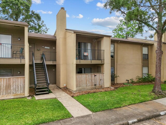 view of property with stairs