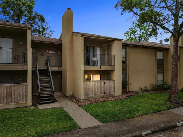 view of property featuring stairway