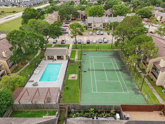 aerial view of residential area with a pool area