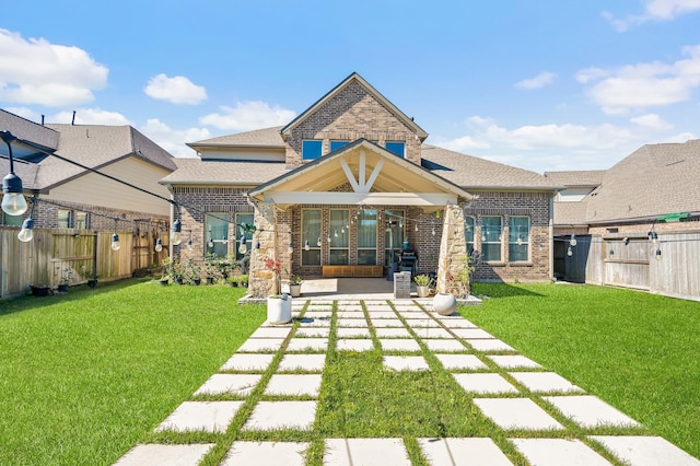 2723 Camellia Ave, Brookshire, TX 77423 - rear view of property with brick siding and a shingled roof
