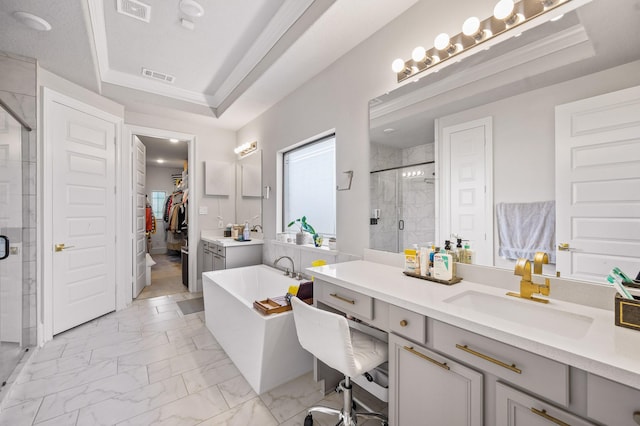 2723 Camellia Ave, Brookshire, TX 77423 - bathroom featuring a stall shower, marble look tile flooring, a freestanding bath, a spacious closet, and vanity