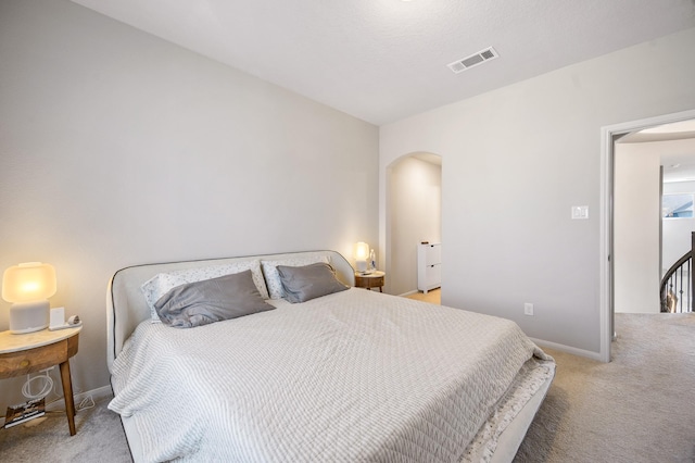 2723 Camellia Ave, Brookshire, TX 77423 - bedroom with carpet floors, arched walkways, and baseboards
