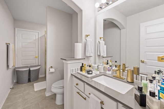 2723 Camellia Ave, Brookshire, TX 77423 - full bathroom featuring toilet, baseboards, tile patterned flooring, vanity, and a shower