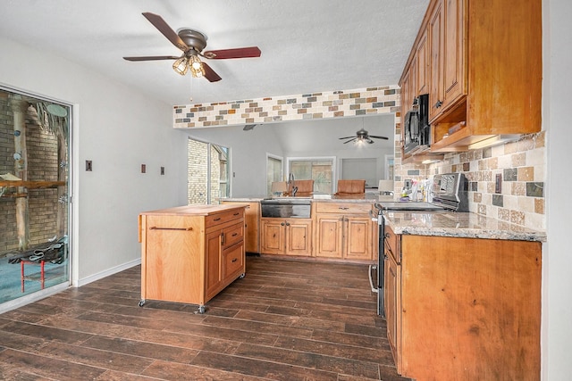 1727 Plumbwood Way, Houston, TX 77058 - kitchen with ceiling fan, black microwave, a sink, range with electric cooktop, and dark wood-type flooring