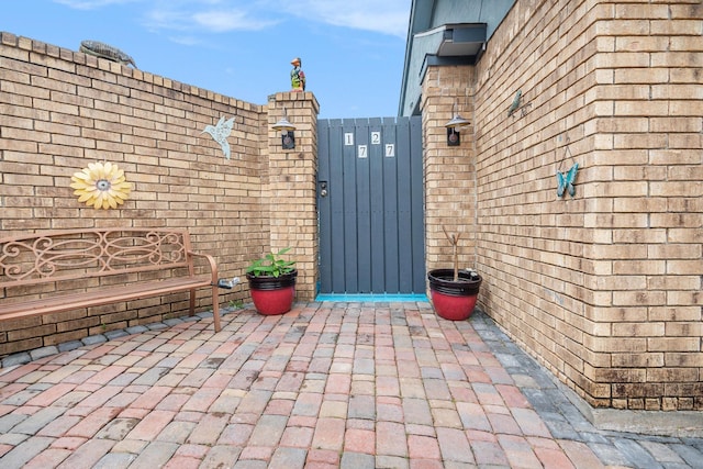 1727 Plumbwood Way, Houston, TX 77058 - view of patio / terrace with a gate