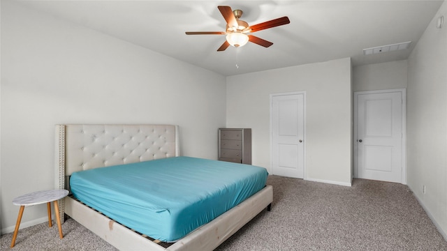 22218 Delphin Grove Dr, Hockley, TX 77447 - bedroom with carpet, baseboards, and a ceiling fan