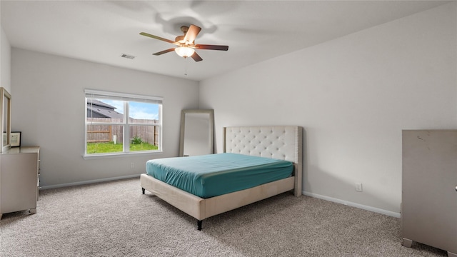 22218 Delphin Grove Dr, Hockley, TX 77447 - carpeted bedroom with baseboards and ceiling fan