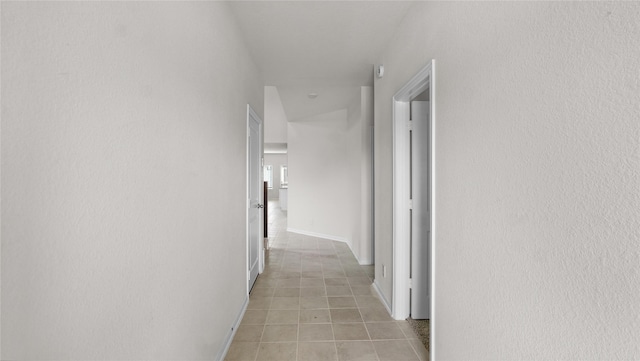 22218 Delphin Grove Dr, Hockley, TX 77447 - hallway with light tile patterned flooring