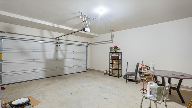 22218 Delphin Grove Dr, Hockley, TX 77447 - garage featuring a garage door opener
