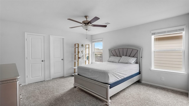 22218 Delphin Grove Dr, Hockley, TX 77447 - carpeted bedroom featuring baseboards and ceiling fan