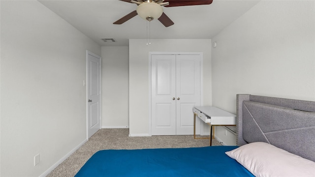 22218 Delphin Grove Dr, Hockley, TX 77447 - bedroom with carpet flooring, a closet, baseboards, and ceiling fan