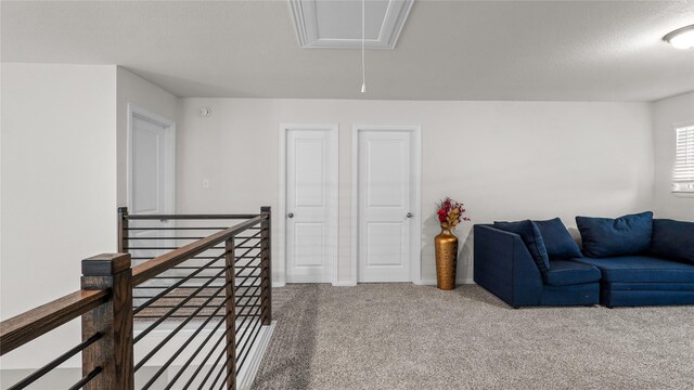 22218 Delphin Grove Dr, Hockley, TX 77447 - carpeted living room with attic access