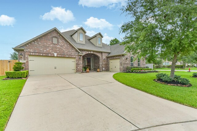 view of front of home with brick siding, a garage, concrete driveway, and a shingled roof