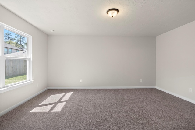 3021 Pampaneria Dr, Conroe, TX 77301 - carpeted empty room with baseboards