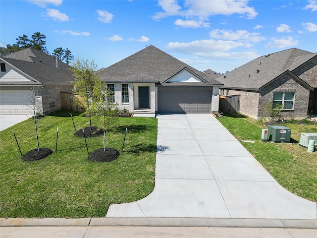 3021 Pampaneria Dr, Conroe, TX 77301 - ranch-style house with driveway, brick siding, a garage, and roof with shingles