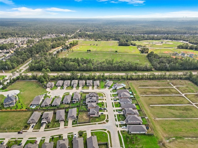 3021 Pampaneria Dr, Conroe, TX 77301 - aerial perspective of suburban area featuring a forest
