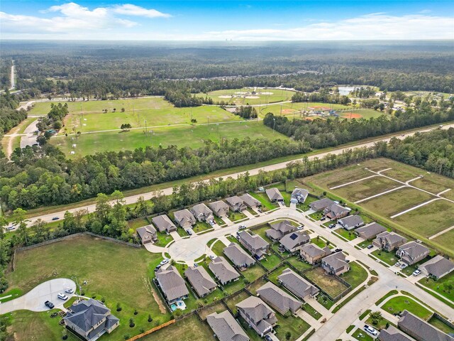 3021 Pampaneria Dr, Conroe, TX 77301 - aerial view of property's location featuring nearby suburban area and a heavily wooded area