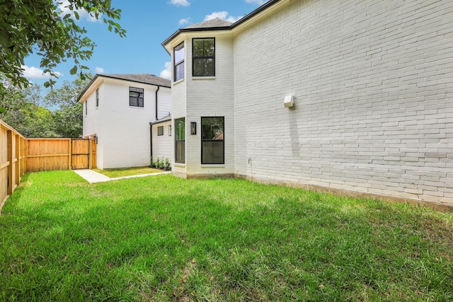 6291/2 Rancho Bauer Dr, Houston, TX 77079 - rear view of house featuring brick siding