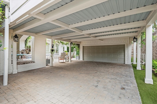 view of patio / terrace with a garage