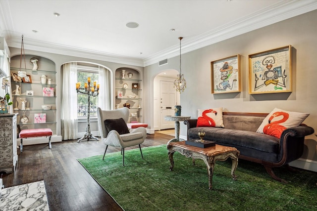 living room with crown molding, arched walkways, built in shelves, and dark wood-style floors