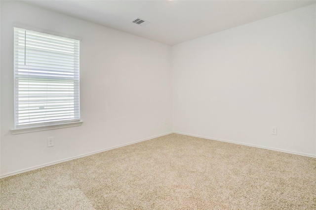 12319 Tranquil Pines Dr, Houston, TX 77014 - spare room featuring carpet flooring and baseboards