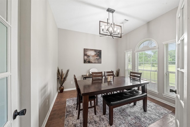 996 Scroggins Ln, Waller, TX 77484 - dining room with a chandelier, dark wood-type flooring, and baseboards