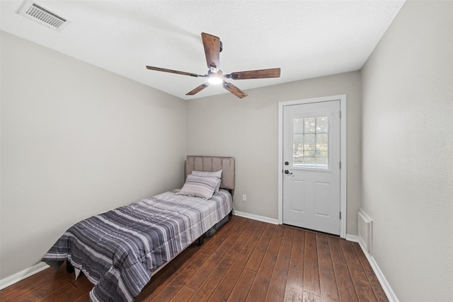 996 Scroggins Ln, Waller, TX 77484 - bedroom with wood-type flooring, baseboards, and ceiling fan
