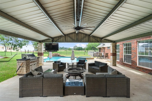 996 Scroggins Ln, Waller, TX 77484 - view of patio featuring an outdoor living space with a fire pit, area for grilling, ceiling fan, an outdoor kitchen, and a pool with connected hot tub