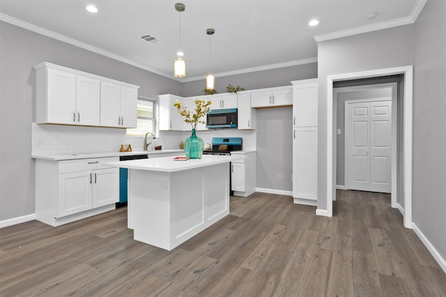 kitchen featuring white cabinetry, backsplash, light countertops, dishwasher, and crown molding
