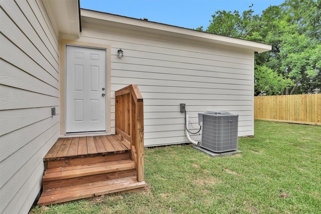 entrance to property featuring central AC unit