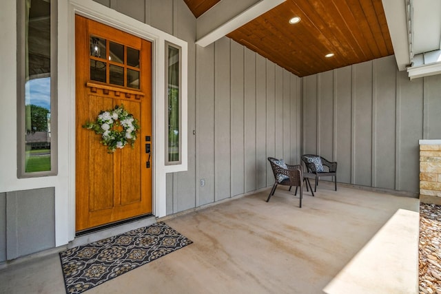100 Calvary Dr, Adkins, TX 78101 - doorway to property featuring covered porch and board and batten siding