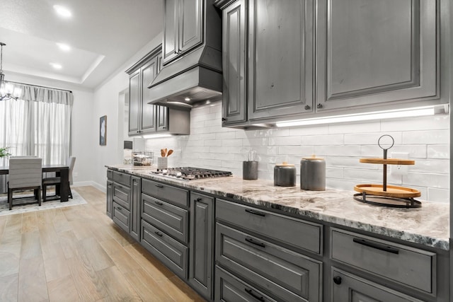100 Calvary Dr, Adkins, TX 78101 - kitchen featuring gray cabinetry, baseboards, light wood-style flooring, and recessed lighting