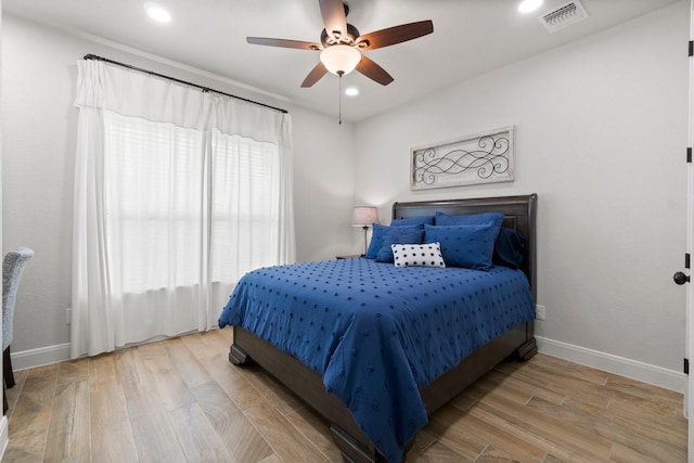 100 Calvary Dr, Adkins, TX 78101 - bedroom with baseboards, light wood-type flooring, ceiling fan, and recessed lighting