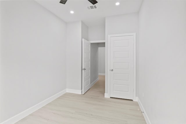 unfurnished bedroom with baseboards, light wood-style floors, recessed lighting, and a ceiling fan