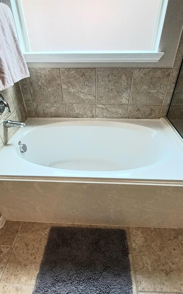 full bath featuring a garden tub