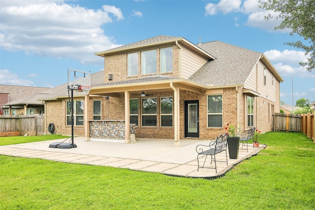 rear view of house featuring brick siding, roof with shingles, and a patio