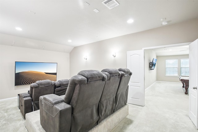 cinema room featuring light colored carpet, baseboards, recessed lighting, and lofted ceiling