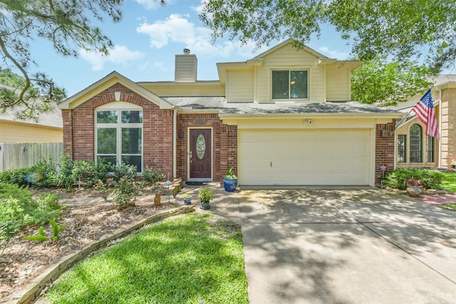 15223 Hillside Park Way, Cypress, TX 77433 - view of front of property with brick siding, an attached garage, driveway, and a chimney