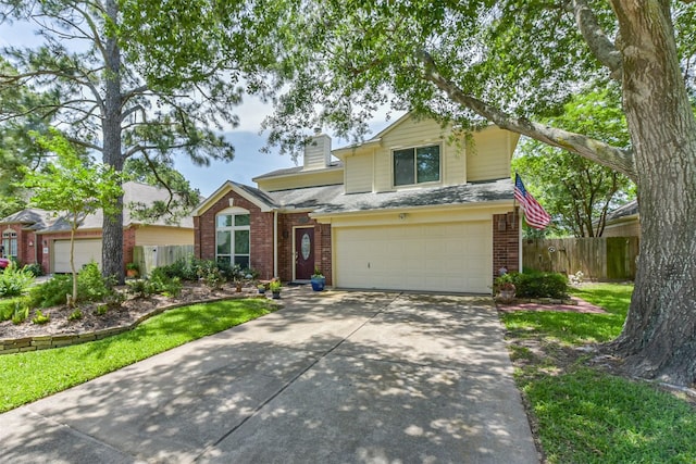 15223 Hillside Park Way, Cypress, TX 77433 - traditional-style house with brick siding, fence, concrete driveway, and an attached garage