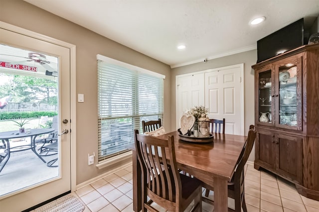 15223 Hillside Park Way, Cypress, TX 77433 - dining room featuring light tile patterned floors, recessed lighting, ornamental molding, and baseboards